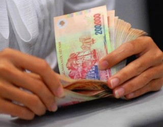 Lương tối thiểu nên tăng chậm hơn